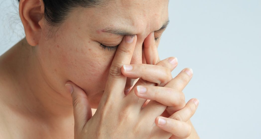 Woman face with sinusitis or sinus pain, health concept